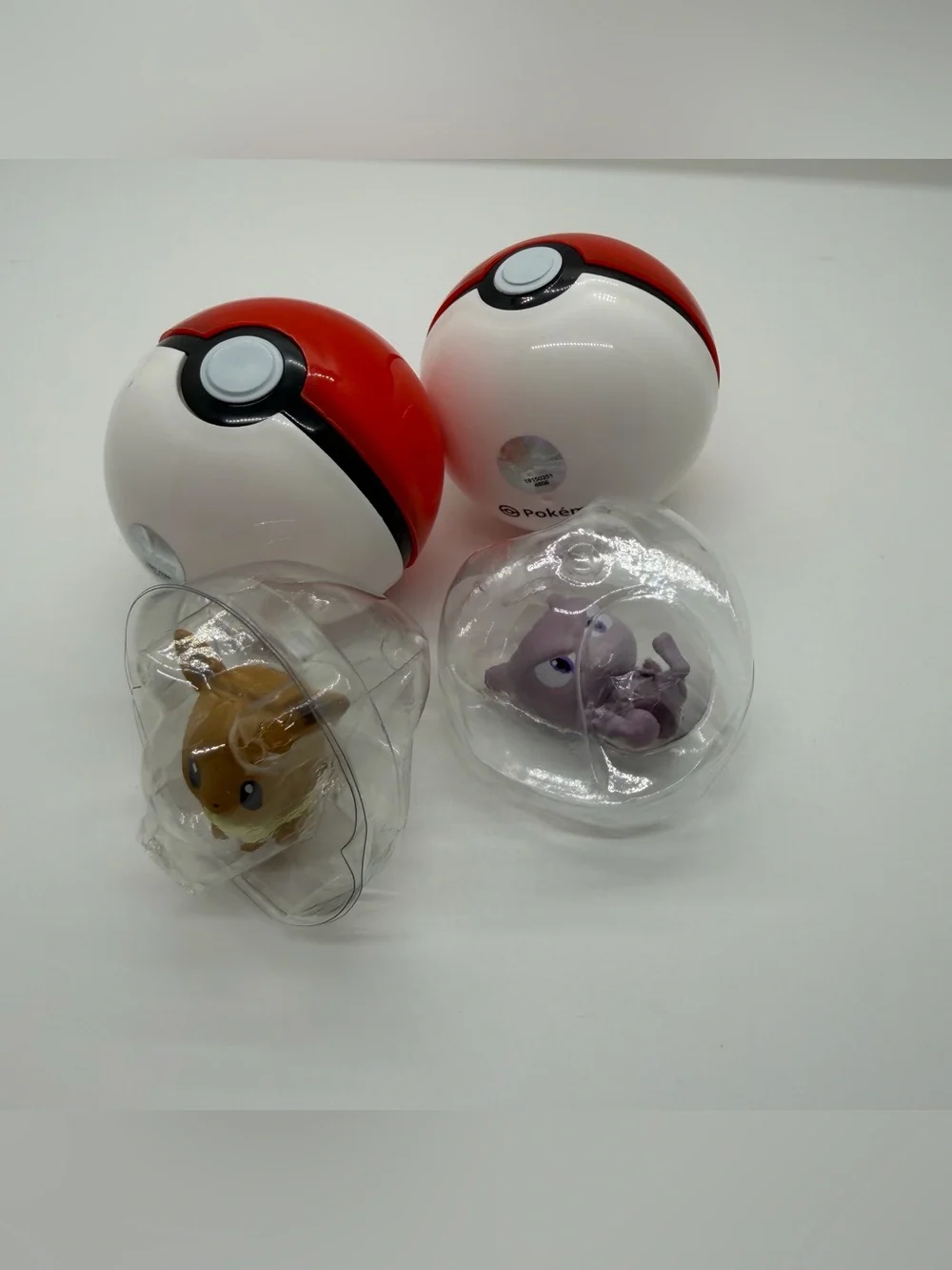 Pokemon (2) Bundle Palmsize Wonders Confirmed Eevie and Mewtwo Figurines